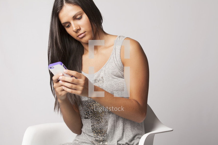 woman looking at her cellphone