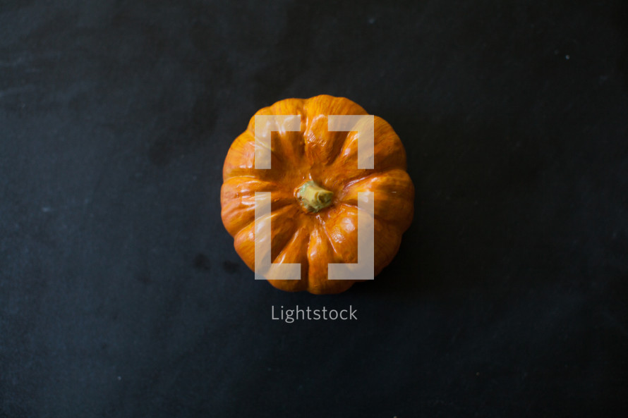 mini pumpkin in the center 