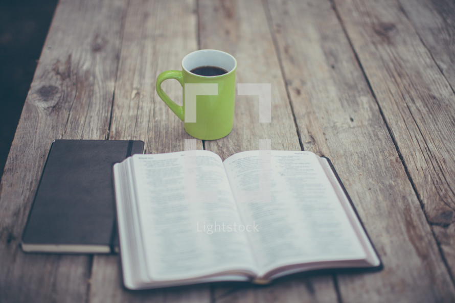 coffee mug and open Bible