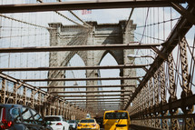cabs crossing the Brooklyn Bridge 