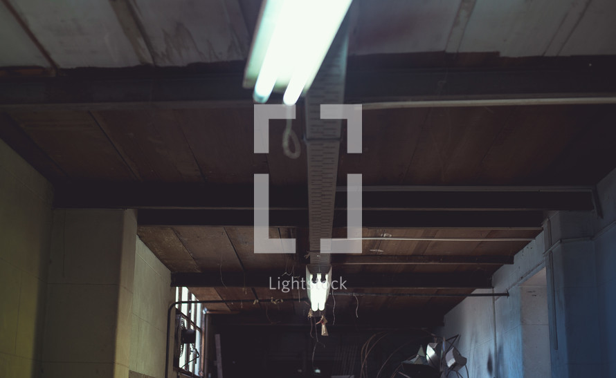 fluorescent lights hanging from a ceiling 