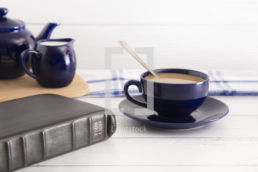 Tea Set with a Hot Drink and Bible 