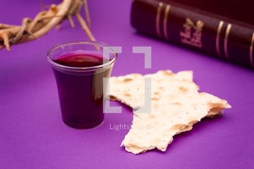 crown of thorns, Bible, communion bread and wine cup 