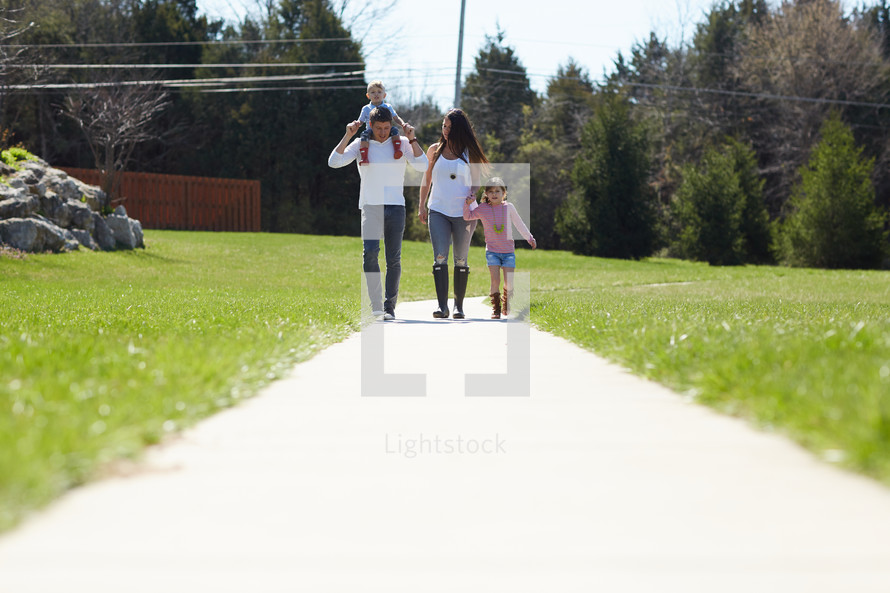 a family going on a walk in spring 