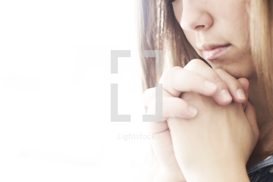 closeup of praying hands 