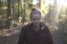 woman hiking in a forest 