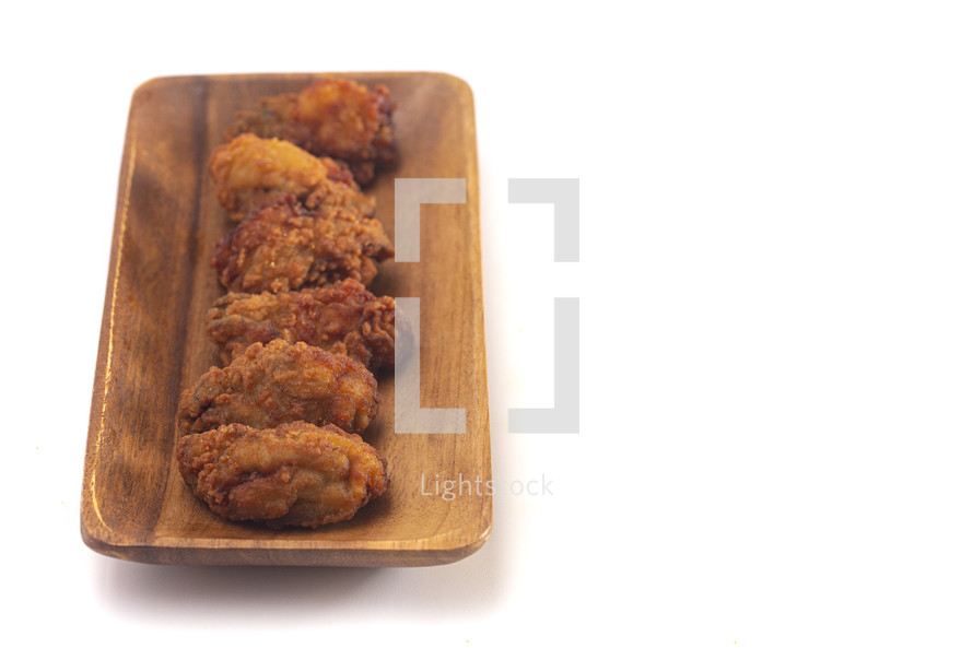 Breaded and Fried Oysters Isolated on a White Background