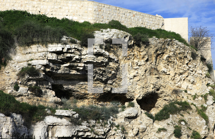 caves, a rocky escarpment that some say looks like Golgotha
