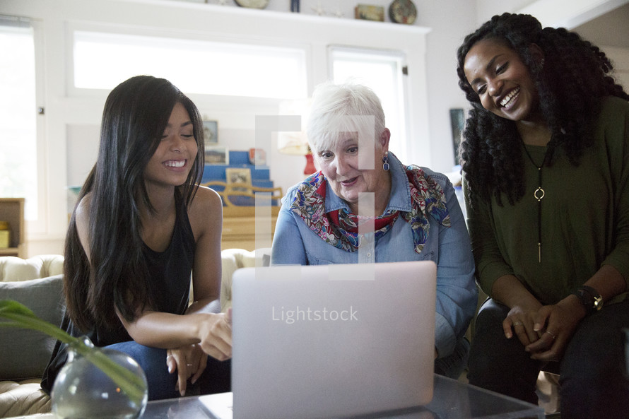 women looking at a computer screen 