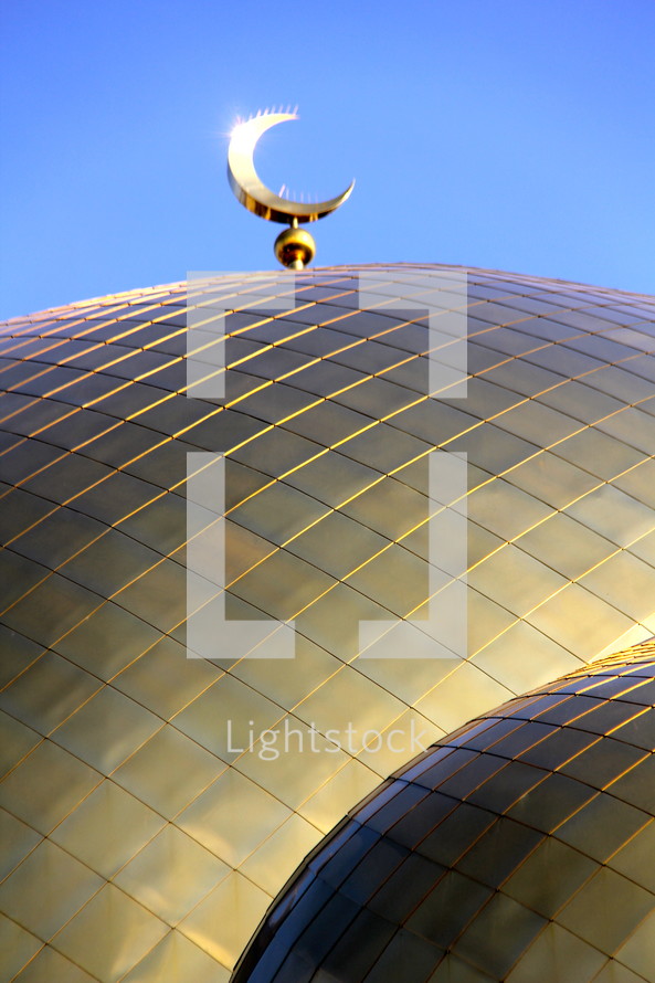 Crescent moon on a mosque dome.