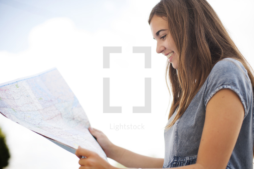 woman looking at a map 