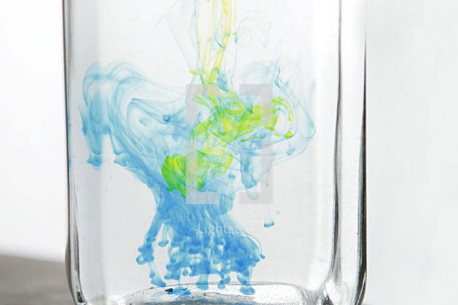 blue and yellow dye in water 