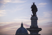 dome and statue at sunset 