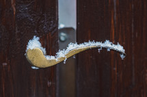 snow on a doorknob 