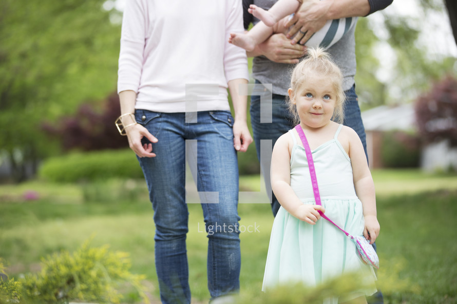 a family walking together at a park 