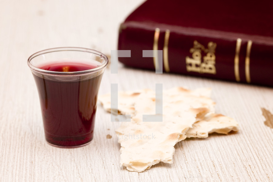 Bible, communion bread and wine cup 