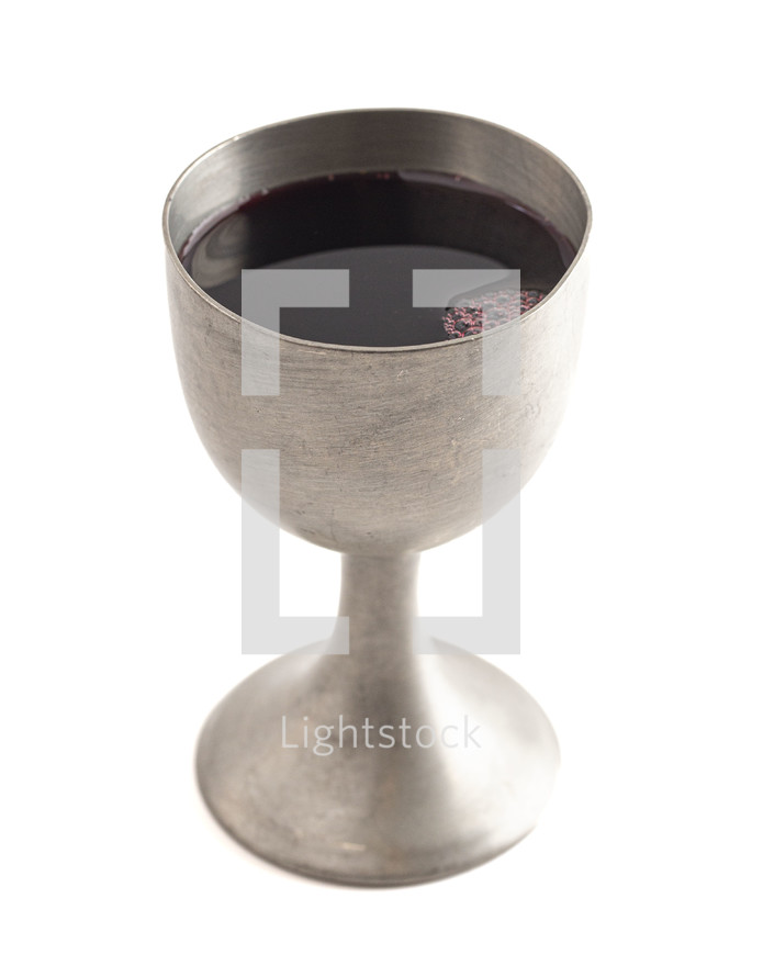 Goblet of Grape Juice in a Pewter Goblet Isolated on a White Background