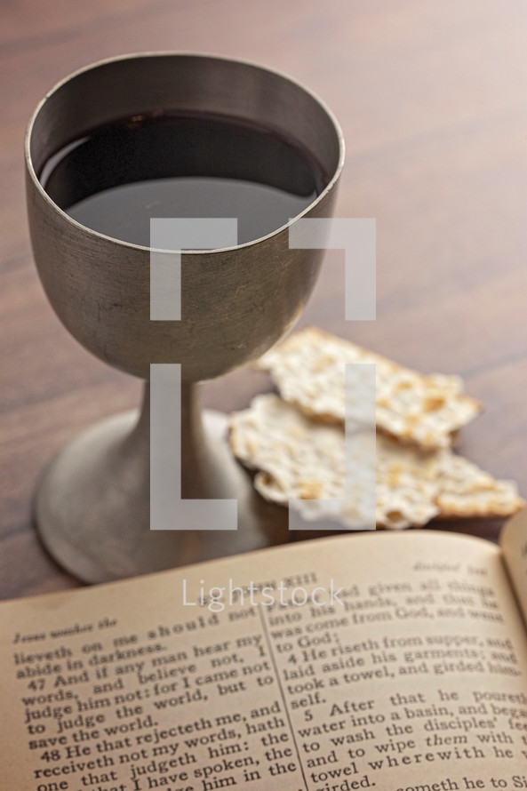 Holy Communion in a Pewter Goblet with an Antique Bible 