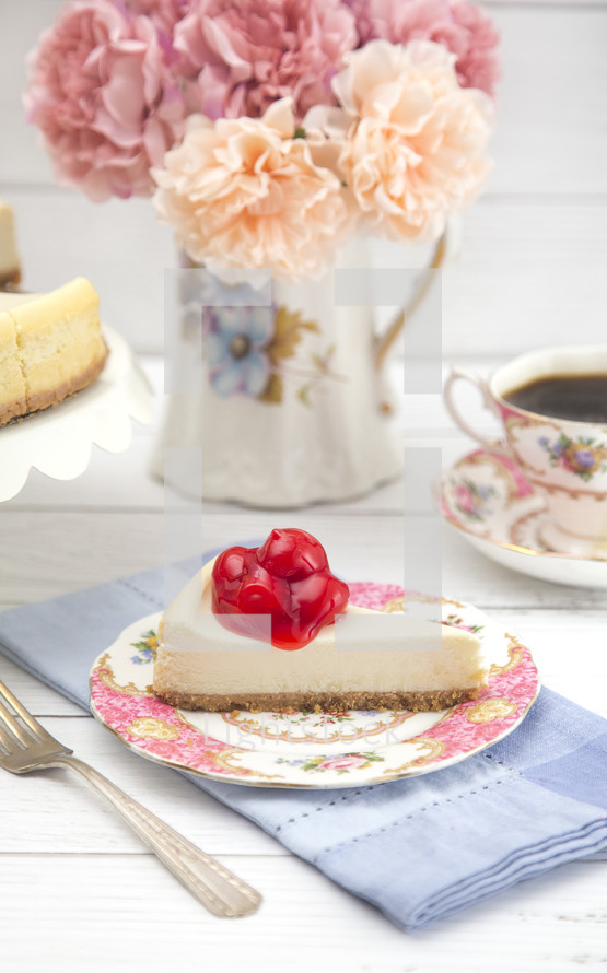 cheese cake slice with cherry topping 