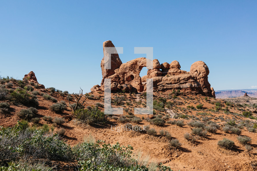 red rocks in desert landscape 