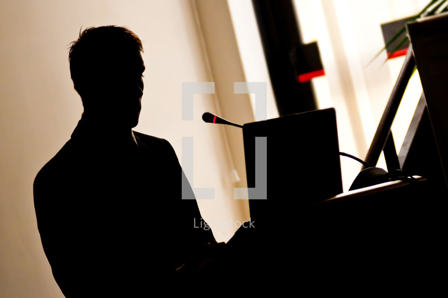 Silhouette businessman during the presentation of of work