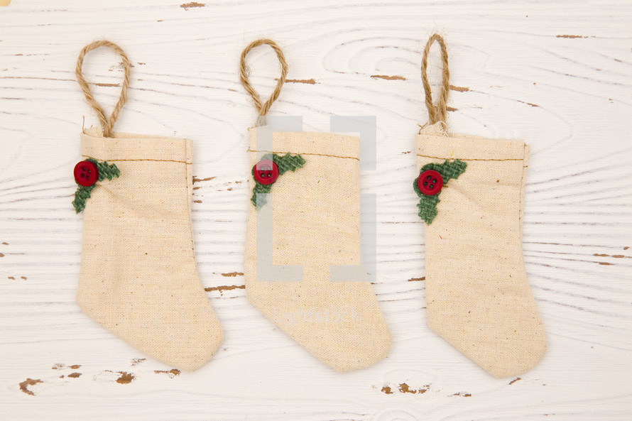 Christmas stockings on a white wood background 