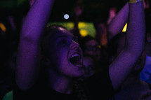 youth in the crowd at a concert 