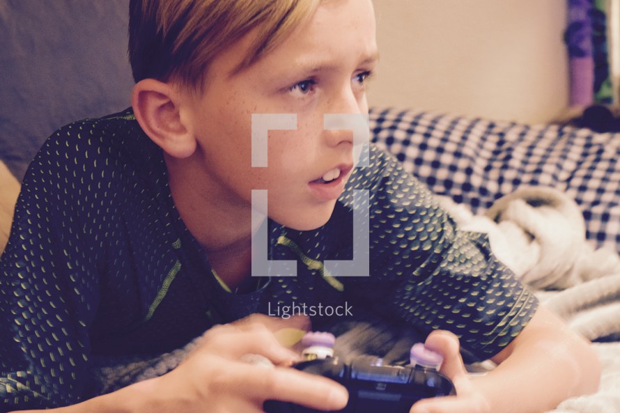 a child playing an XBOX one video game 