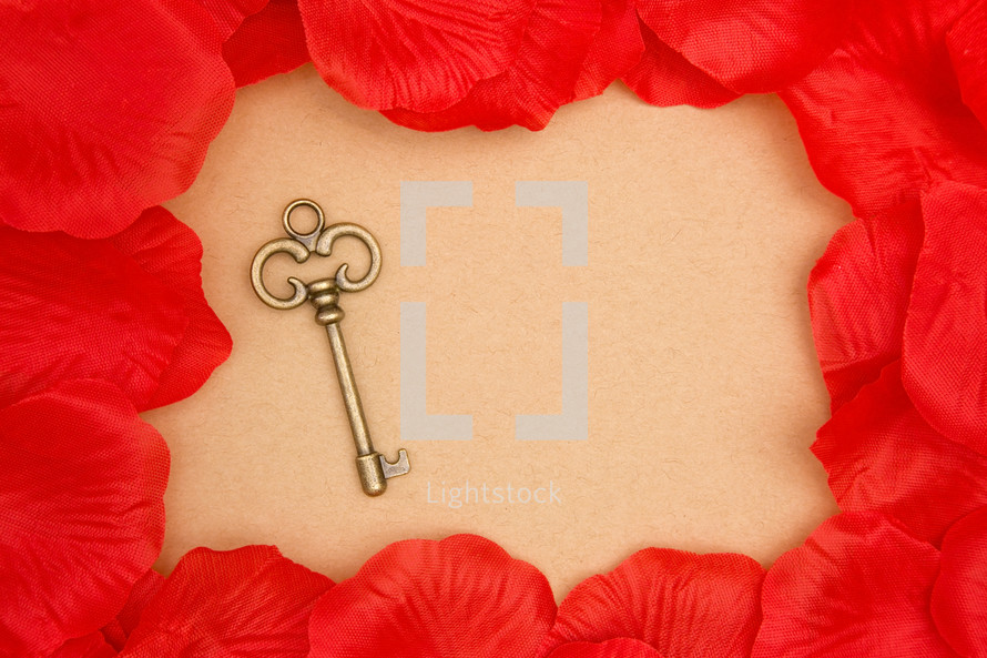 red rose petals and skeleton key 