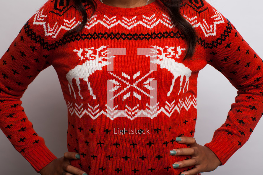 woman in a Christmas sweater 