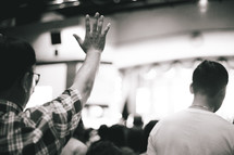 raised hands during a worship service 