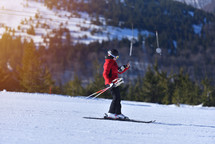 Woman Snaps Photo While Skiing Down the Mountain