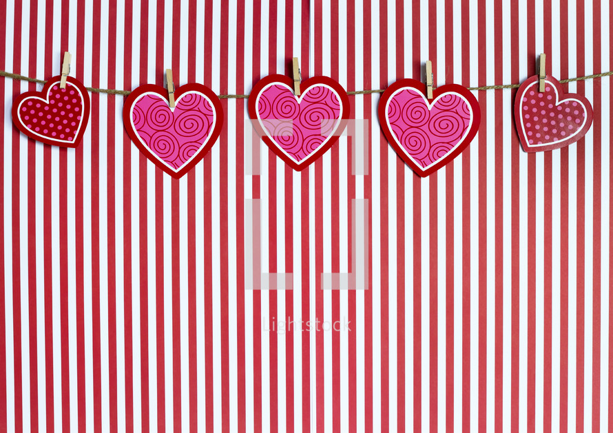 hearts banner and striped background 