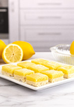 Batch of Lemon Bars on a Square Dish on the Kitchen Counter