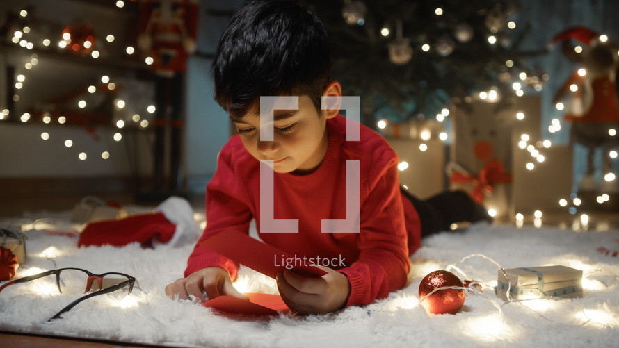 Kid with red letter for Santa Claus