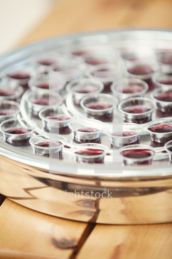communion cups in a tray