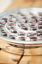 communion cups in a tray