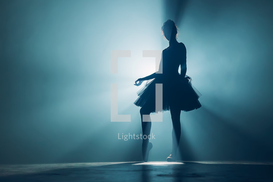  Silhouette of incredible girl dancing ballet in tutu on stage in front of spotlight. Volumetric painting, smoke scene. 