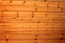 Wall of cedar planks.