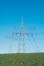 Electrical poles/towers in farm field