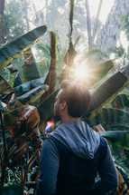a man standing in a jungle 