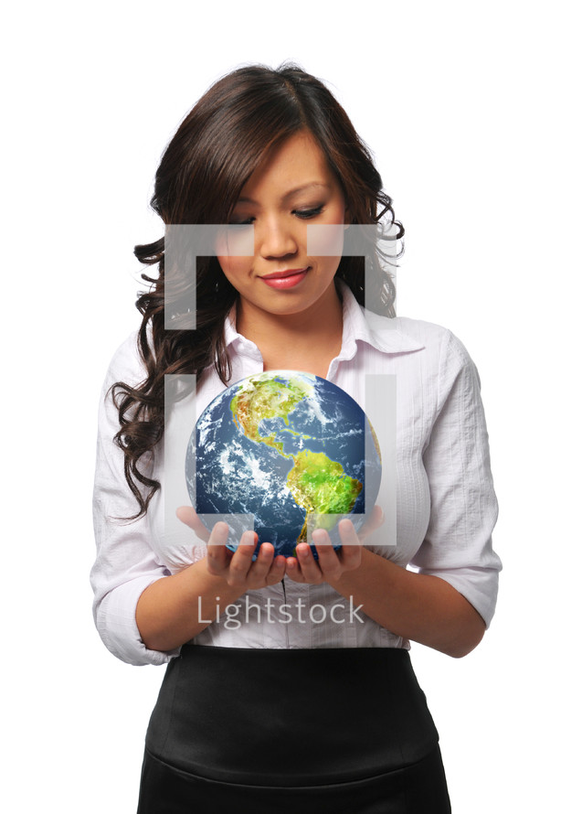 Woman holding the earth in her hands.