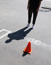 cone in a reserved parking space 