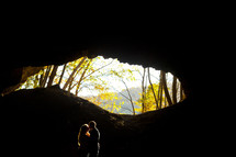 couple kissing in a cave 