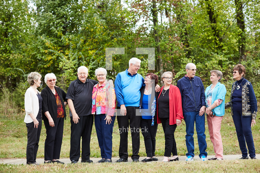 senior citizen fellowship group standing together 