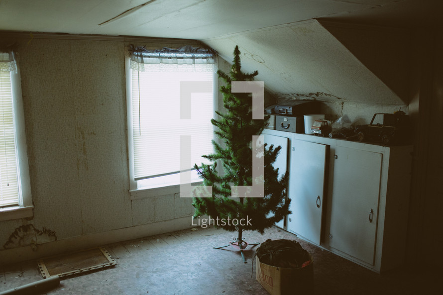 stored Christmas tree in an attic 