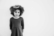 little girl in a tiara 
