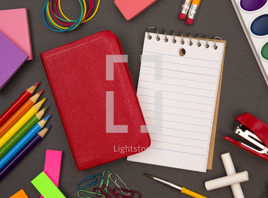 school supplies and notepad with copy space 