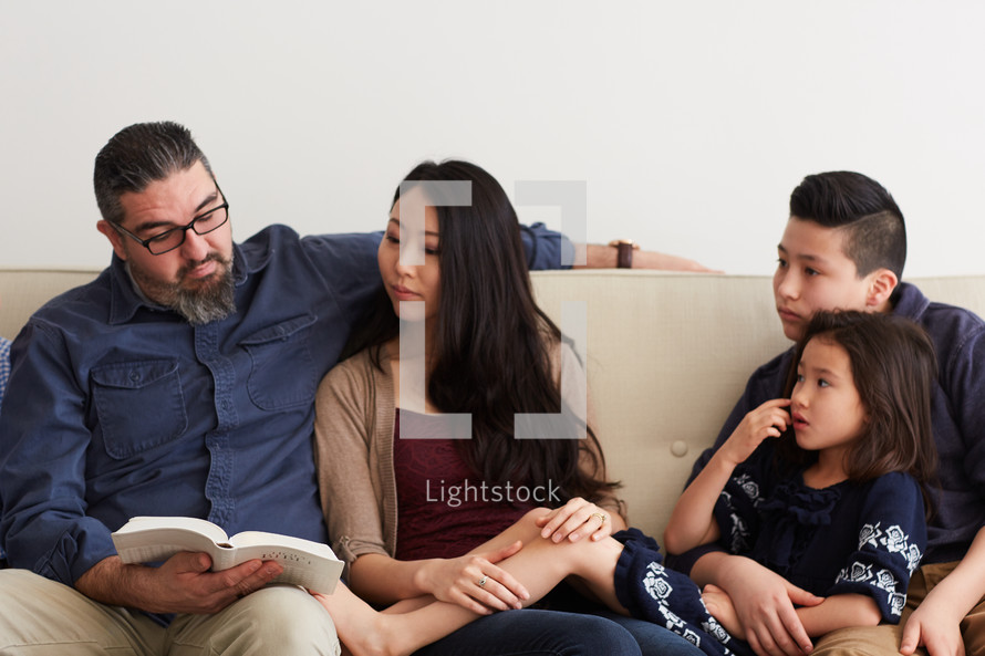 quality family time spent reading a Bible together 