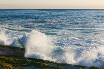 waves crashing onto the shore 
